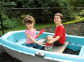 Kids in play boat